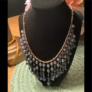 Necklace with blue beads cascade of stones gold tone chain